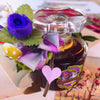 Pangolin Violette Rose opens with jasmine auriculatum and jasmine sambac and has top notes of candied violet.