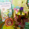 The Vintage Corsage Solid Perfumes come in a matchbook style box covered in jewel colored crepe paper with silver or gold Dresden foil edging.