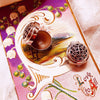 The sterling silver, opal-esque jewel boxes are stunning are tucked into petite Luminous Lemur boxes.